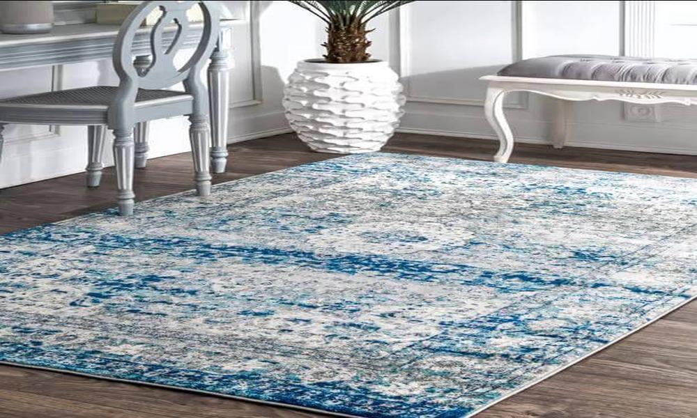 What are the benefits of using area rugs in interior design